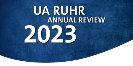 Blue background with the words “UA Ruhr Annual Review 2023"